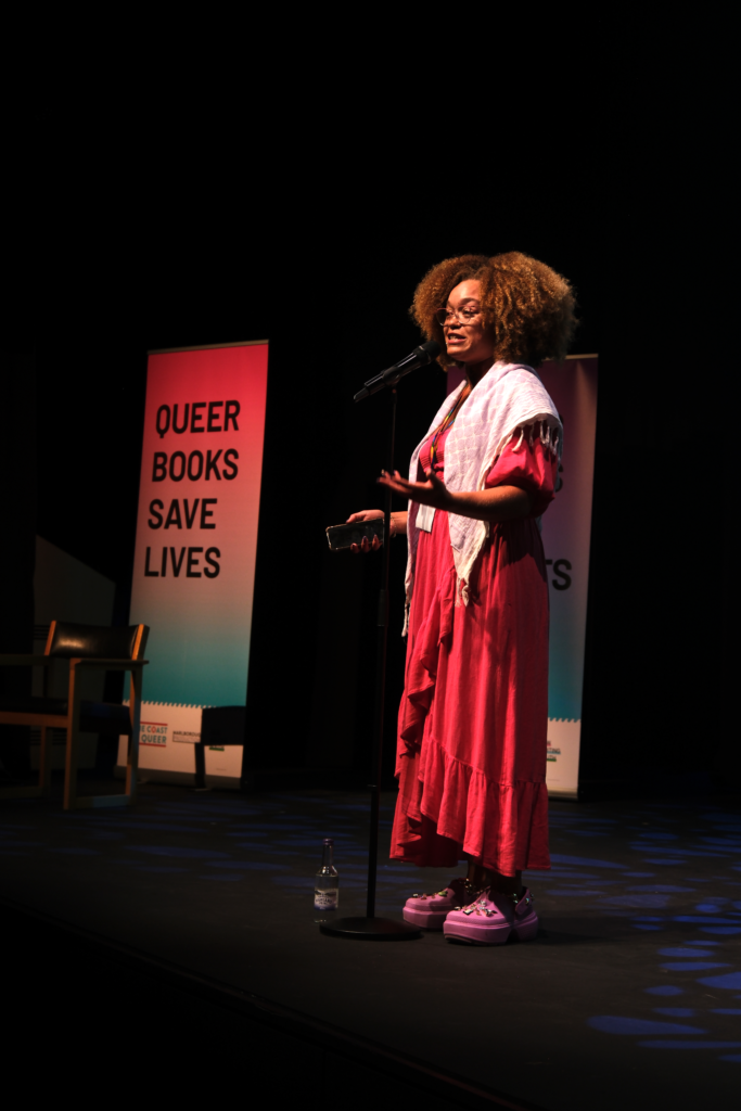AFLO. the poet performing at The Coast Is Queer 2025