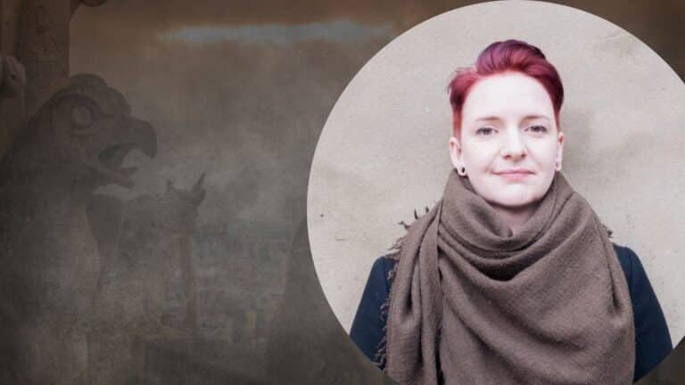 Heather Parry, a yougn white woman with short ginger hair, in a circle with a dark gothic gargoyle background