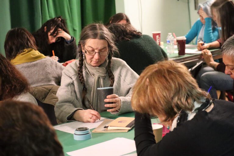 Women writing at a workshop in Crawley at Forthwrite