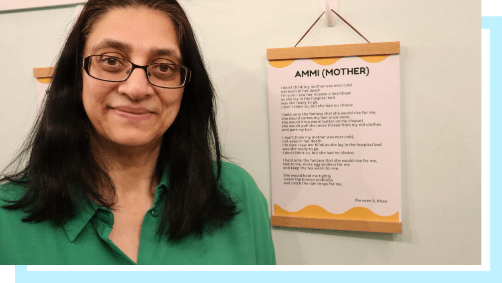 Parveen Khan, a middleaged Asian woman with dark hair, stands by a poem.