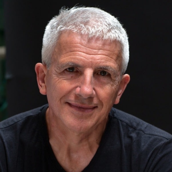 Patrick Gale, an older white man with short, white hair and a black top
