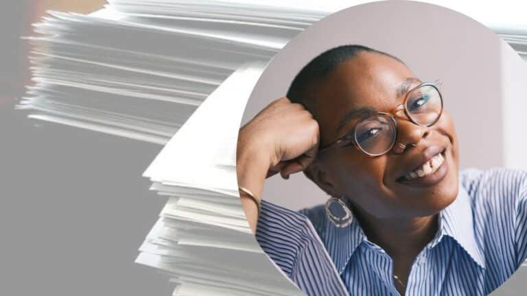 Paula Akpan, a shorthaired Black woman, with a background image of a pile of paper