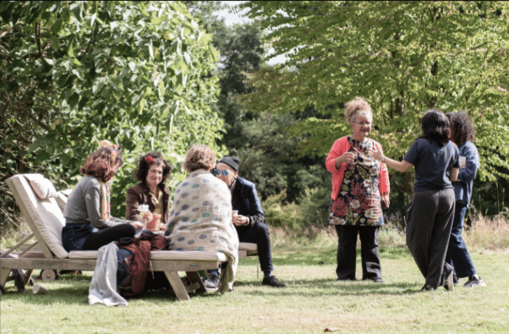 Writers chat outside