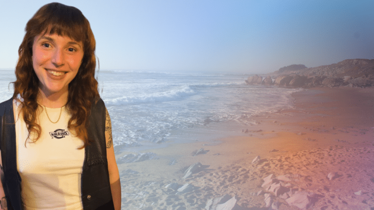 Marcella Rick Marcella, a young white woman with brown hair stands in front of a beach scene